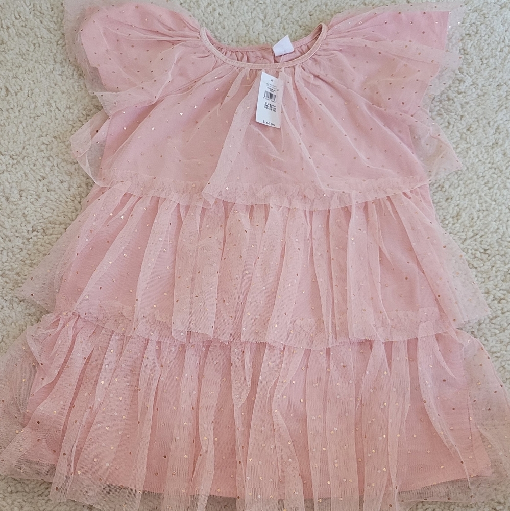 Soft pink glitter dress.